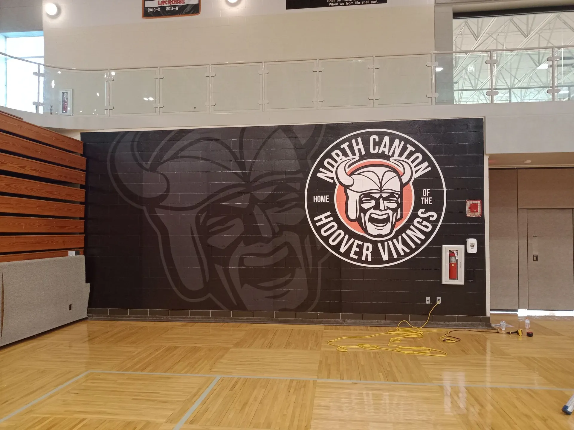North Canton Hoover Vikings printed wall graphic on a block gymnasium wall